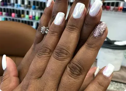 brown hands white silver nail polish