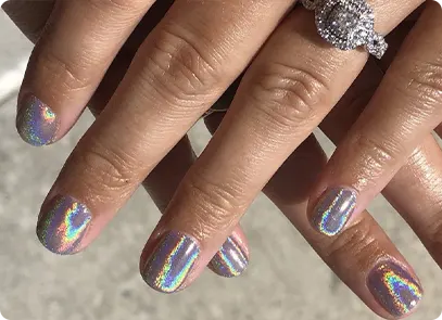 brown hands silver nail polish